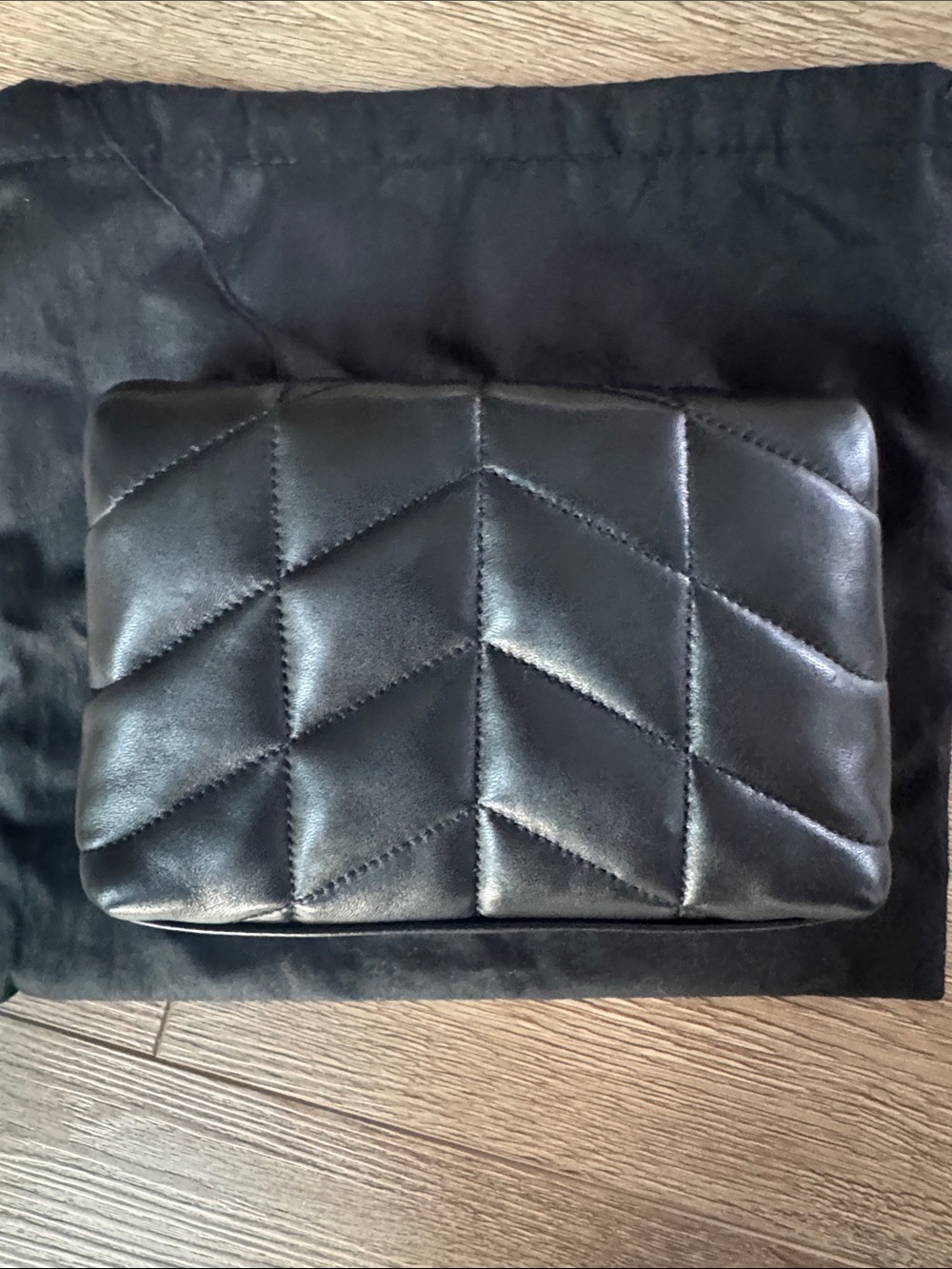 Saint Laurent Black Quilted Lambskin Clutch with Gold YSL Accent
Small 8”x 5” - Picture 6 of 6